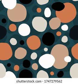 Abstract seamless pattern with colorful dots and ovals. Minimalistic style. Vector illustration. White, beige, orange, green and black. Dark background.