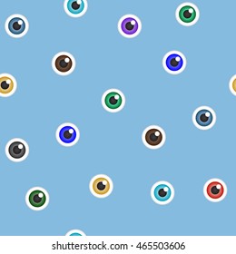 Abstract seamless pattern with colorful eyes on blue background