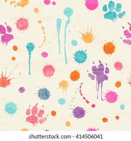 Abstract seamless pattern with colorful ink splashes, blots and dog paw prints on a off-white background. Happy childish backdrop for wrapping, packaging, textile and interior decoration