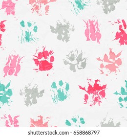 Abstract seamless pattern - colorful ink prints with realistic messy dog / cat paws. Creative backdrop with regular animal footprints