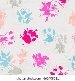 Abstract seamless pattern - colorful ink prints with messy dog / cat paws. Creative backdrop with irregular animal footprints