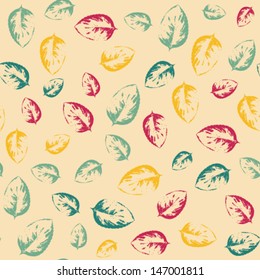 Abstract seamless pattern with colorful leaves on bright yellow background