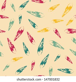 Abstract seamless pattern with colorful leaves on light yellow background