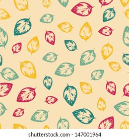 Abstract seamless pattern with colorful leaves on yellow background