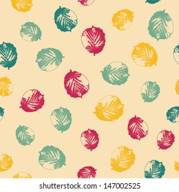 Abstract seamless pattern with colorful leaves on bright background