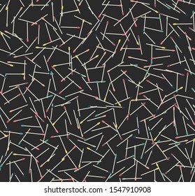 Abstract, seamless pattern. Colorful pins and matches are randomly scattered on a black background