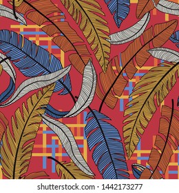 Abstract seamless pattern with colorful tropical leaves and plants on red background. Vector design. Jungle print. Floral background. Printing and textiles. Exotic tropics. Bright design.