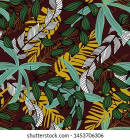 Abstract seamless pattern with colorful tropical leaves and plants on Burgundy background. Vector design. Jungle print. Floral background. Printing and textiles. Exotic tropics. Fresh design.