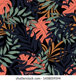 Abstract seamless pattern with colorful tropical leaves and plants on black background. Vector design. Jungle print. Flowers background. Printing and textiles. Exotic tropics. Fresh design.
