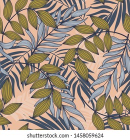 Abstract seamless pattern with colorful tropical leaves and plants on beige background. Vector design. Jungle print. Flowers background. Printing and textiles. Exotic tropics. Fresh design.