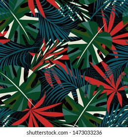 Abstract seamless pattern with colorful tropical leaves and plants on black background. Vector design. Jungle print. Floral background. Printing and textiles. Exotic tropics. Summer.