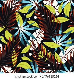 Abstract seamless pattern with colorful tropical leaves and plants on black background. Vector design. Jungle print. Floral background. Printing and textiles. Exotic tropics. Summer.