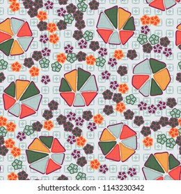 Abstract seamless pattern composed of five-petalled and seven-petalled flowers.
The picture is placed on the background of the diamonds of the prisoners in squares.
