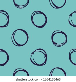 An abstract seamless pattern consisting of circles drawn by hand. Circles drawn in the style of a sketch by pen. Vector eps illustration.