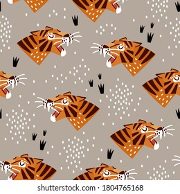 Abstract seamless pattern with cute hand drawn tiger faces. Childish background for fabric, wrapping, textile, wallpaper, apparel.