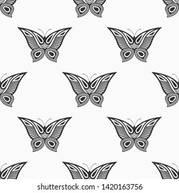 Abstract seamless pattern of decorative butterflies, isolated on white background. Repeating ornament. Modern stylish texture. Vector monochrome illustration.