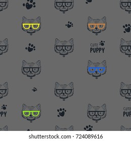 Abstract seamless pattern with dog face, glasses, paw. Puppy character. Animal repeated backdrop. Childish wallpaper.