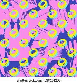 Abstract seamless pattern with donuts in Memphis style. Background for printing brochure, poster, party, summer print, vintage textile design, sport wear.