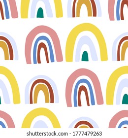 Abstract seamless pattern with doodle rainbows. Hand drawing fantastic colorful rainbow in kids drawing style. Childish scandinavian trendy vector illustration. Modern flat cartoon texture on white