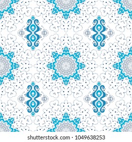 Abstract seamless pattern of dots and curls.