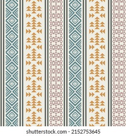Abstract seamless pattern with ethnic aztec ornament. Colorful rhombus, stripe and triangle geometric pattern on beige background.