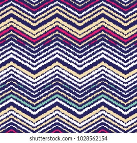 Abstract seamless pattern in ethnic style. Warm fabric.