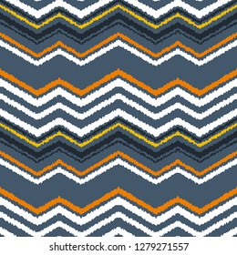 Abstract seamless pattern in ethnic style. Warm fabric.