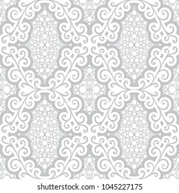 Abstract seamless pattern with floral motifs.