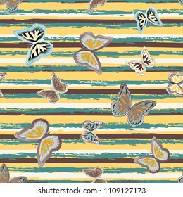 Abstract seamless pattern with flying butterflies on a background of colored stripes. The quadrangular texture of the summer. Vector illustration. Suitable for fabric, wallpaper, packaging.