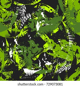 Abstract seamless pattern with fots, brush track, grunge urban shabby elements in black, white, green colors. Chaotic repeated backdrop for textile,clothes, wrapping paper. 