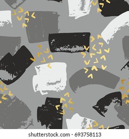 Abstract seamless pattern with golden brush strokes. Decorative background for printing, design and decoration of packaging and wrapping paper, covers, postcards and other surfaces