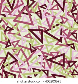 Abstract seamless pattern of green, purple, pink and maroon overlapping triangles chaotic scattered on a light green background.
