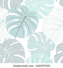 Abstract seamless pattern with green tropical monstera leaves. Vector element for design.