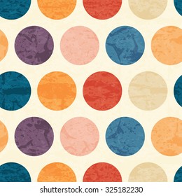 Abstract seamless pattern with grunge colorful polka dots on a off-white background. Lovely color palette. Endless backdrop for wrapping, packaging, textile and interior decoration