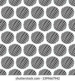 Abstract seamless pattern of hand drawn striped circles. Textured circles pattern. Brush strokes. Geometric shapes ornament. Diagonal lines of different thickness. Monochrome vector background.