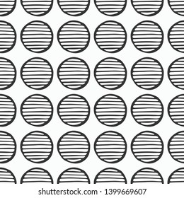 Abstract seamless pattern of hand drawn striped circles. Textured circles pattern. Brush strokes. Geometric shapes ornament. Monochrome vector background.