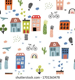 Abstract seamless pattern with hand drawn city design. Trendy kids vector background. Perfect for kids apparel, fabric, textile