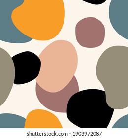 Abstract seamless pattern with hand drawn doodle various colored shapes, spots and drops. Vector illustration.