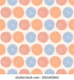 Abstract seamless pattern with hand drawn circles in soft blue, peach orange and pink colors. Bright colorful doodle with positive retro vibe. For textile design, cards, wrapping paper, scrapbooking.