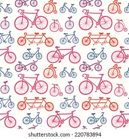 Abstract seamless pattern with hand drawn bicycles. Multicolored bikes ornament