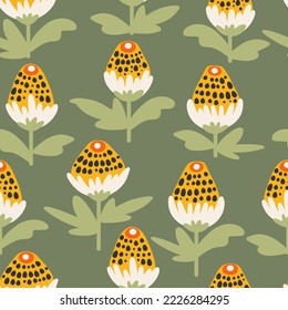 Abstract seamless pattern with hand drawn funny bold flowers and on a green background. Cute floral background in vector. Perfect for textile packaging or stationery.
