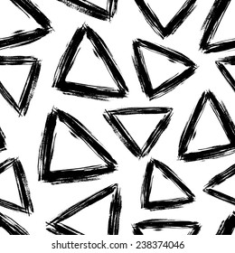 Abstract seamless pattern with hand drawn triangles. Vector illustration.