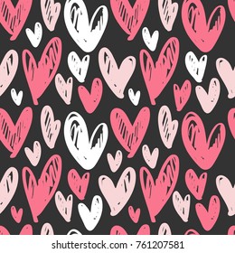 Abstract seamless pattern with hand drawn hearts. Ink illustration.