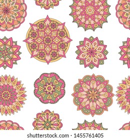 Abstract seamless pattern of hand-drawn mandalas in beautiful colors on white background