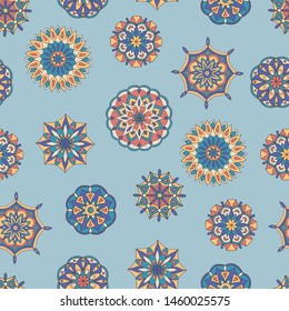 Abstract seamless pattern of hand-drawn mandalas in beautiful colors