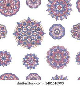 Abstract seamless pattern of hand-drawn mandalas in beautiful colors on white background
