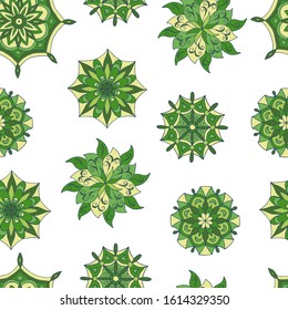 Abstract seamless pattern of hand-drawn mandalas in green colors on white background, for the design of covers, packaging, print on textiles, wallpaper, fabric