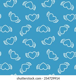 Abstract seamless pattern with hearts and wings.