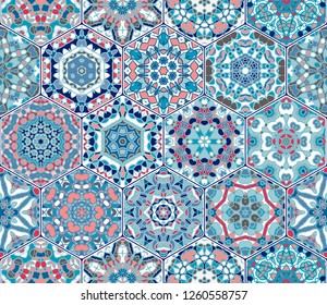 Abstract seamless pattern of hexagonal tiles. Ornament in vintage style. Colorful vector set of elements for design of wallpaper, fabric or wrapping paper.