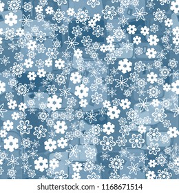 Abstract seamless pattern of ice colors on a background of a variety of snowflakes.